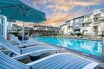 Heated saltwater relaxation pool and spa with cabanas